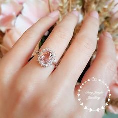 Morganite Halo engagement ring padparadscha sapphire colour | Etsy Pink Oval Sapphire Ring With Halo Setting, Classic Pink Topaz Wedding Ring, Classic Pink Topaz Ring For Wedding, Oval Morganite Jewelry For Proposal, Pink Morganite Wedding Ring, Pink Morganite Halo Ring, Oval Pink Morganite Jewelry, Pink Emerald-cut Sapphire Wedding Ring, Classic Pink Oval Topaz Ring