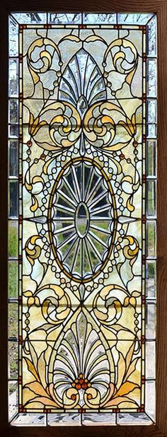 a stained glass window with an ornate design