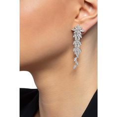 These exquisite 18k White Gold Ghirlanda Classics Earrings with Diamonds from Pasquale Bruni will take your breath away. The delicate garland design, gracefully wrapping around your earlobe, is studded with brilliant diamonds that glimmer in the light, adding a touch of sparkle to any outfit. These earrings are the perfect accessory for any occasion, whether you're dressing up for a night out or adding a touch of elegance to your everyday look. The craftsmanship and attention to detail are evide Fine Jewelry Bridal Drop Earrings, Elegant Chandelier Earrings With Diamond Cut Cubic Zirconia, Luxury Bridal Drop Earrings With Sparkling Stones, Luxury Bridal Dangle Earrings With Sparkling Stones, Luxury White Gold Cluster Drop Earrings, Elegant Cubic Zirconia Chandelier Earrings With Diamond Cut, Elegant Diamond Cut Cubic Zirconia Chandelier Earrings, Elegant Yellow Gold Chandelier Earrings With Diamond Accents, Fine Jewelry Cubic Zirconia Bridal Earrings For Evening