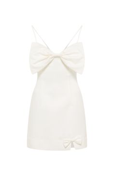 a white dress with a bow on the back