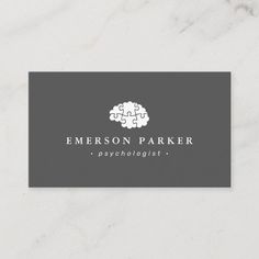 a business card with the words,'emerson parker'in white and grey on it