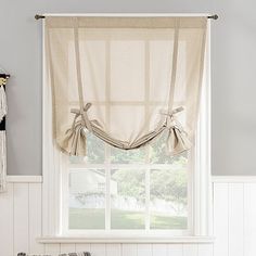 The Lawson tie-up shade from no. 918 adds personality to any window. Ideal for kitchens, bathrooms and other smaller windows, this shade gently filters light while enhancing privacy. Rod pocket design allows for simple slide-through installation on curtain rods up to 1 ½" in diameter.Number of Panels: 1Included: 1 Valance(s)Top Construction: Rod PocketTop Opening: 1 1/2 In Rod PocketUse: IndoorBase Material: 100% PolyesterLining: UnlinedLight Filtration: Light-FilteringCare: Machine WashC French Door Window Treatments, French Door Windows, Tie Up Valance, Bath Window, Tie Up Curtains, Tie Up Shades, Bathroom Window Curtains, Bathroom Window Treatments, Door Window Treatments