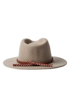 Pure wool felt elevates a Western-inspired fedora with timeless appeal. 100% wool Spot clean Imported Fitted Leather Fedora For Fall, Elegant Flat Bill Fedora For Fall, Fall Fedora Fur Felt Hat, Fall Fur Felt Fedora Hat, Fur Felt Fedora For Fall, Elegant Leather Fedora For Fall, Wide Brim Wool Felt Hat For Fall, Brown Wool Felt Hat With Flat Bill, Beige Wool Felt Hat For Fall