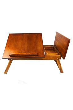 a wooden table with two trays on each side and one sitting on the other