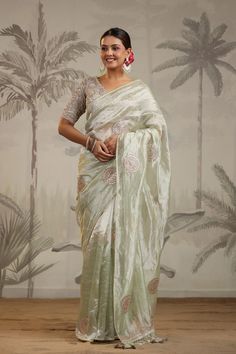 Shop pista green tissue silk sari online in USA with embroidered blouse. Make a fashion statement on festive occasions and weddings with designer suits, Indian dresses, Anarkali suits, palazzo suits, designer sarees, sharara suits, Bollywood saris from Pure Elegance Indian fashion store in USA.-full view Pista Green Raw Silk Pre-draped Saree For Diwali, Eid Pista Green Dola Silk Pre-draped Saree, Embroidered Green Pre-draped Saree In Dola Silk, Festive Pista Green Tussar Silk Pre-draped Saree, Pista Green Tissue Silk Blouse Piece With Zari Work, Pista Green Tissue Silk Pre-draped Saree With Zari Work, Green Pre-draped Saree With Zari Weaving In Dola Silk, Pista Green Pre-draped Saree With Pallu In Tissue Silk, Silk Pre-draped Saree In Pista Green With Resham Embroidery