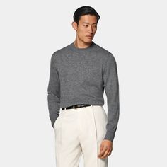 This grey crewneck sweater is tailored to a slim fit and features a soft and light texture and a ribbed hem and cuffs. Classic Gray Sweater With Ribbed Collar, Gray Sweater With Ribbed Collar For Work, Classic Gray Sweatshirt With Ribbed Cuffs, Classic Gray Sweater With Ribbed Cuffs, Classic Gray Sweater For Workwear, Fitted Gray Sweater With Ribbed Cuffs, Gray Cashmere Crew Neck Sweater, Gray Cashmere Sweater With Ribbed Collar, Modern Gray Winter Sweater