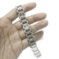 Elegant art deco / retro inspired platinum bracelet. Round natural diamonds 12.38 ct. Diamonds in G-H color clarity VS. Length: 18.6 cm Width: 1.5 cm Weight: 67 g [shortcode] [video] [/video] [/shortcode] Luxury Art Deco Round Bracelets, Luxury Art Deco Platinum Tennis Bracelet, Art Deco Diamond Cut Platinum Bracelet, Luxury Vintage Diamond Cut Bracelet, Art Deco Platinum Diamond Cut Bracelet, Platinum Bracelet, Deco Retro, White Gold Bracelet, 18k Gold Jewelry