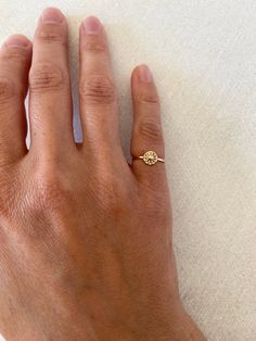 Hey honey, it's sunny!  Adorn yourself or a loved one with this sweet, comfortable and delicate 14k solid gold ring. DETAILS: -6mm sun disk -1mm flat band *Hallmarked 14k *Handmade to order *Model wears US size 2.5 Solid gold sales are final. Thank you Dainty Round Jewelry With Sun Design, Everyday Round Sun Design Jewelry, Dainty Stackable Round Rings Stamped 14k, Everyday Yellow Gold Jewelry With Sun Design, Everyday Yellow Gold Sun Design Jewelry, Dainty Yellow Gold Initial Ring, Gold Coin Ring, Gold Ring Band, Sun Ring