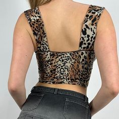 Take a walk on the wild side with the Rayne Leopard Print V-Neck Crop Top. The sleeveless design and slim fit provide a sexy, stylish look, while the lace detailing adds a touch of femininity. Part of the Alees Fashion Streetwear Collection, this top is a basic must-have with a fierce twist. Details Rayne Leopard Print V-Neck Crop Top Sleeveless V-Neck Lace Detailed Slim Fit Sexy, Stylish, Basic Alees Fashion Streetwear Collection