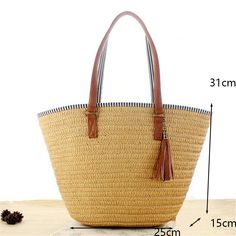 This high-quality rattan tote bag is perfect for the beach. Hand-woven from natural straw, it features a versatile design, a cell phone pocket, and is fully lined and reinforced for additional durability. It comes in beautiful styles and easy to match colors like black, khaki, beige, and green. These practical high capacity bags will have you on-trend and ready for any summer occasion. SPECIFICATIONS tote bag: large capacity tote bag straw bag: fashion straw bag shoulder bag: summer beach should Straw Beach Bag, Woven Handbags, Straw Handbags, Rattan Bag, Bag Summer, Straw Bags, Round Bag, Tassel Bag, Handmade Handbags