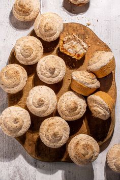 Hertzoggies on a wooden board on a white background. Apricot Jam Cookies, Coconut Tartlets, Coconut Meringue, Cape Malay, Meringue Topping, Bunny Chow, Milk Tart, Mini Tart Pans, Baking Recipes Cookies