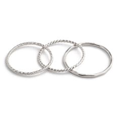 These delicate, hand-forged bands are a perfect addition to any ring collection. Worn alone, in a stack, or alongside one of our gemstone rings, these textured bands add a fun element of layering detail. Select your metal, style, and size from our drop down menu. Shown in Sports Illustrated Swimsuit Stacking Bands, Ring Collection, Sports Illustrated Swimsuit, Sports Illustrated, Metal Style, Ring Collections, Hand Forged, Gold Filled, Silver Bracelet