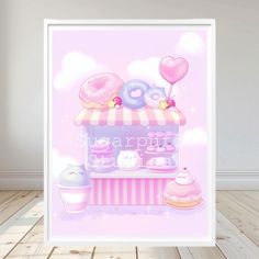 a pink poster with donuts and doughnuts on it in front of a white wall