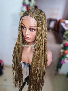 Boho Braid Wig, Gold Braid Wig, Braided Wigs, Cornrow Braid Wig, Ghana Weave Braided Wig NEED OTHER STYLES AND COLORS OF BRAIDED WIGS, AFRICAN HEADWRAPS AND CORAL BRIDAL BEADS, VISIT OUR SHOP HERE: https://sereneafrica.etsy.com Colour: Gold (color 27) length: 22 inches Lace: Lace Front Transform into a stunning goddess with this exquisite long gold braid wig featuring intricate cornrows! Made with a lace front for a seamless and realistic look, this Ghana weave braided wig is perfect for adding Intricate Cornrows, Boho Braid, Braid Wig, Box Braid Wig, Braided Wigs, Braided Wig, Braids With Weave, Beauty Games, Cornrows Braids