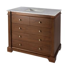 a bathroom vanity with marble top and drawers