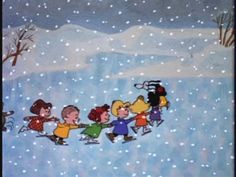 a group of children playing in the snow