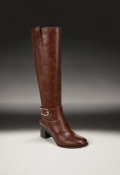 Now-trending, always classic. An oversized buckle detail gives these stunning, endlessly comfortable tall boots a modern touch. Faux leather upper with an almond toe, inside zipper for easy on/off, and now-trending oversized strap and buckle detail. Linings crafted with partially recycled materials. Brown Knee-high Heeled Boots With Buckle Closure, Classic Faux Leather Boots With Buckle Closure, Brown Buckle Closure Knee-high Boots For Work, Brown Knee-high Boots With Buckle For Work, Brown Wide Calf Heeled Boots With Buckle, Brown Wide Calf Heeled Boots With Buckle Closure, Wide Calf Faux Leather Boots With Buckle Closure, Brown Heeled Boots With Buckle For Fall, Brown Workwear Boots With Buckle Closure