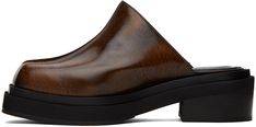 Find ECKHAUS LATTA Zoe Clogs on Editorialist. Polished leather slip-on sandals in brown. · Painted effect throughout · Square toe · Logo-embossed padded leather footbed · Grained leather lining · Stacked wood heel with rubber injection · Foam rubber midsole · Rubber sole · Heel: H2 Supplier color: Brown Brown Leather Clogs With Textured Sole, Modern Brown Slip-on Clogs, Modern Brown Leather Clogs, Modern Brown Round Toe Mules, Modern Brown Mules With Round Toe, Brown Slip-on Mules With Textured Sole, Brown Textured Sole Slip-on Mules, Brown Leather Footbed Mules, Brown Leather Mules With Textured Sole