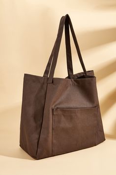 Carry your essentials in style with our Coffee Brown Woven Tote. This spacious and durable tote features a rich coffee brown hue and a classic woven design, making it perfect for everyday use or beach outings. Product code: CAC12F4H006HH Features:  Material: 100%POLYESTER. Casual Brown Canvas Bag, Casual Brown Canvas Bag For Daily Use, Casual Brown Canvas Shoulder Bag, Casual Brown Cotton Canvas Bag, Casual Brown Canvas Bag With Large Capacity, Casual Brown Large Capacity Canvas Bag, Brown Rectangular Canvas Bag With Pockets, Large Capacity Brown Canvas Bag, Trendy Brown Cotton Canvas Bag