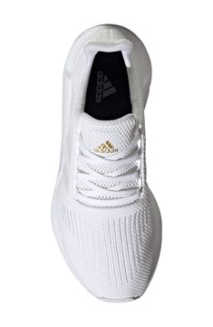 Run errands or hit the streets in this running sneaker constructed from a lightweight knit with comfortable cushioning and a grippy rubber sole. Textile and synthetic upper/textile lining/rubber sole Imported Adidas Swift Run, Shoe Women, Running Sneakers, Lightweight Knit, White White, Running Shoe, Womens Running Shoes, The Streets, Rubber Sole