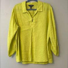 Never Worn, Front Button, Wider Sleeves And Be Buttoned. Yellow Long Sleeve Vacation Shirt, Yellow Relaxed Fit Blouse For Vacation, Yellow Long Sleeve Linen Top, Yellow Relaxed Fit Blouse With Buttons, Yellow Button-up Vacation Tops, Relaxed Fit Yellow Blouse With Buttons, Yellow Button-up Top For Vacation, Yellow V-neck Top With Button Closure, Yellow Beach Top With Buttons