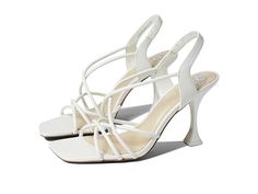 Vince Camuto Sanda - Women's Shoes : Coconut Cream : The Vince Camuto Sanda sandal offers endless styling options with crisscross tubular straps and an eye-catching flared heel. Slip-on with slingback strap. Square open toe. Leather upper. Synthetic lining, insole and outsole. Imported. Measurements: Heel Height: 3 1 2 in Weight: 0.4 oz Product measurements were taken using size 7, width M. Please note that measurements may vary by size. Weight of footwear is based on a single item, not a pair. Trendy Synthetic Strap Sandals, Trendy Synthetic Sandals With Straps, Evening Cross Strap Synthetic Sandals, Chic Cross Strap Sandals For Formal Occasions, Formal Sandals With Crisscross Ankle Straps, Summer Evening Heels With Crisscross Straps, Elegant Cross Strap Sandals With Padded Heel, Summer Evening Sandals With Crisscross Straps, Evening Sandals With Crisscross Straps For Summer