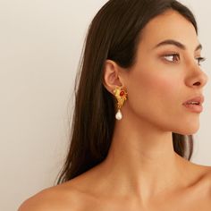 Dive into a world of coastal elegance with our Reef earrings, crafted using real Costa Rican coral as inspiration, these earrings embody the intricate beauty of a sea reef, featuring 24K gold-plated metal with coral red resin. Delicate pearls adorn the bottom of each earring. With a comfortable clip-on backing, these earrings ensure a secure and comfortable fit. All jewelry is handcrafted and made to order in our New York City design studio. Please allow 7-14 business days for production from the order date. Measurements: 1 3/4" L Elegant Coral Earrings For Formal Occasion, Coral Elegant Jewelry With Matching Earrings, Elegant Coral Jewelry With Pearl Drop, Elegant Coral Dangle Earrings, Elegant Coral Drop Earrings, Beachy Necklace, Coastal Elegance, Costa Rican, Summer Earrings