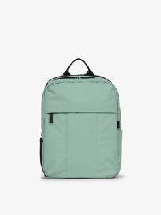 a green backpack on a white background