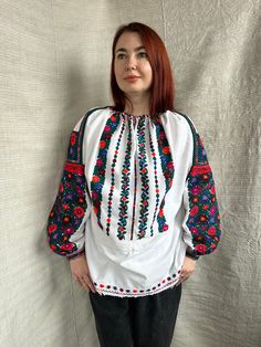 So  beautiful and expressive style depicts in vintage Romanian blouse So much handmade area of embroidery, expressive and dominant  colours Very fashionable and hippie one embroidered Handmade item Great condition! Bleached antique fabric Will suit to  S-M and L size Traditional Long Sleeve Shirt With Intricate Embroidery, Fall Blouse With Multicolor Floral Embroidery, Traditional Blouse With Embroidered Sleeves, Festive White Top With Embroidered Sleeves, Long Sleeve Embroidered Folk Shirt, Embroidered Long Sleeve Folk Shirt, Traditional Long Sleeve Shirt With Floral Embroidery, Fall Festival Blouse With Floral Embroidery, Bohemian Blouse With Multicolor Embroidery For Fall