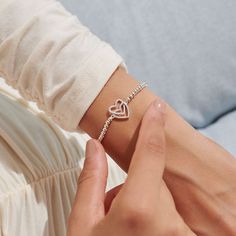 This beautiful bracelet is yours to treasure, our bond is something that will last forever. A Little 'Soulmate' Bracelet In Silver Plating features a captivating stretch design and a pretty double heart charm. Wrapped around a stylized cards and framed with a sweet sentiment, this piece is sure to make a standout gift and a wonderful addition to your loved one's collection Silver-plated One Size Fits All Designed In The UK, Customized In The US Nickel Free Katie Loxton is a brand that’s driven b Soulmate Bracelet, Katie Loxton, Bracelet In Silver, A Day To Remember, Luxury Products, Double Heart, Affordable Luxury, Beautiful Bracelet, Heart Charm