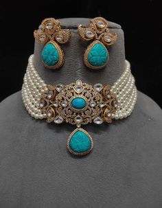 Turquoise Kundan Choker Necklace, a tribute to Sabyasachi's style. This Polki Choker and Jadau Jewelry ensemble exudes opulence, showcasing the allure of Kundan Bridal Jewelry. The Kundan Choker Set celebrates tradition and artistry, reflecting regal charm. Indulge in the resplendent beauty of this jewelry set, where every piece captures the essence of Kundan and Polki craftsmanship, creating a captivating blend of elegance and cultural richness.this necklace will match your al outfits  Perfect Elegant Turquoise Kundan Necklace For Festive Occasions, Festive Turquoise Jewelry For Party, Bollywood Turquoise Stone Work Jewelry, Bollywood Style Turquoise Jewelry With Stone Work, Bollywood Style Turquoise Stone Work Jewelry, Festive Turquoise Kundan Necklace In Temple Jewelry Style, Traditional Turquoise Kundan Necklace For Festive Occasions, Turquoise Meenakari Necklace For Wedding, Festive Turquoise Stone Work Jewelry