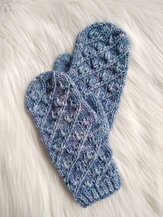 Available now! The matching fingerless mitts and full coverage mittens for the Veela series features delicate florals with slanted spiraling stitches. Pattern includes full instructions for both versions and 2 yarn weights (worsted and light bulky). This is stunning in a single ply yarn such as @malabrigoyarn Mecha and Worsted. Knitting Clothes Patterns, Fingerless Gloves Knitted Pattern, Glove Pattern, Single Ply Yarn, Craft Knitting, Malabrigo Yarn, Fingerless Mitts, Knit Mittens, Hat Knitting Patterns