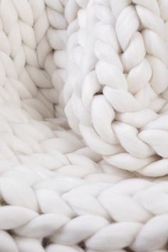 a close up view of some white yarn