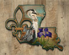 the state of mississippi with a bird on it's back and purple irises