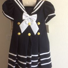 Navy Blue And White Strip Dress For Girls Comes With Beret. Perfect For Cruises And Special Occasions. Very Detailed With Gold Buttons. Bon Voyage! Navy Fitted Cute Dress, Cute Fitted Navy Dress, Cute Navy School Dress, Cute Navy Dress For Dress-up Occasions, Fitted Cotton Nautical Dress, Cream Formal Dresses, Zara Girls Dresses, Pink Toddler Dress, Girls Sailor Dress