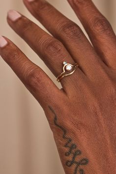 This subtly curved ring can be paired with others to create a unique stack or worn alone for a simple statement. 14k solid Fairmined yellow gold Arc Width: 14.5mm Height 2mm Band Width: 1.5mm Don't see the size you're looking for listed? Other sizes are available at no additional cost! To order, simply select the nearest size and specify in the "add special instructions to your order" box which size you would like. We'll take it from there! On Inclusive Sizing — don't see the size you're looking Minimalist Solitaire Open Band Jewelry, Solitaire Yellow Gold Open Band Jewelry, Yellow Gold Solitaire Open Band Jewelry, Minimalist Open Band With Tension Setting, Minimalist Single Diamond Open Band Jewelry, 14k Gold Rings With Si Clarity, Adjustable 14k Gold Minimalist Bypass Ring, Timeless Rings With Tension Setting For Everyday, Classic Everyday Rings With Tension Setting