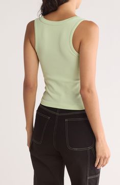 A low-scooping neckline frames this sleeveless tank that's ideal for your warm-weather adventures. Scoop neck Sleeveless 94% nylon, 6% spandex Hand wash, line dry Imported Summer Ribbed Stretch Tank Top, Ribbed Stretch Tank Top For Summer, Summer Stretch Ribbed Tank Top, Solid Sleeveless Seamless Crop Top, Casual Scoop Neck Seamless Camisole, Casual Solid Seamless Tank Top, Casual Seamless Solid Tank Top, Casual Seamless Solid Color Tank Top, Spring Stretch Mesh Tank Top