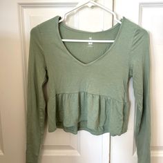 Pacsun Green Flowy Longsleeve Color: Green/Sage Green Size: Xs (I Wear A Size Small For Reference) Condition: Brand New W/Tags (Only Worn In The Picture For Reference) Super Cute Pacsun Flowy Longsleeve! Perfect For Back To School Or Summer! So Flowy And Comfy! Brand New With Tags And Only Worn In The Picture! Open To Reasonable Offers! Feel Free To Comment With Any Questions Or Concerns! Summer Long Sleeve Tops For Brunch, Trendy Long Sleeve Tops For Vacation, Long Sleeve Summer Top For Brunch, Green Stretch Long Sleeve Top For Spring, Long Sleeve Tops For Vacation In Spring, Stretch V-neck Long Sleeve Top For Summer, Summer Long Sleeve V-neck Top, Casual Long Sleeve V-neck Top For Spring, Casual V-neck Long Sleeve Top For Spring