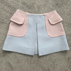 Size 46. I Am A Large Borderline Xl And It Fits Me (Tight But It Fits, Lol). Please Do Your Research On Sizing Before Purchasing I Will Not Accept Returns Because Of Sizing. Note There Are Two Tiny Dark Spots In The Front And One Indentation In The Back Not Noticeable When Wearing. Could Use A Dry Clean. Side Pockets Are Functional And Don’t Add Much Bulk If You’re Curvy. Back Zipper. Pink And Blue Pastel. Miumiu Skirt, Blue Pastel, Dark Spots, Miu Miu, Womens Skirt, Tights, Dry Clean, Pastel, Zipper