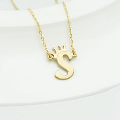 Personalized Initial with Crown Necklace - 925 Sterling Silver Necklace - Dainty Crown Letter Necklace - Gold Jewelry - Christmas Gift * High quality Handmade Sterling Silver item * Yellow, Rose and Silver as color options * Rose gold and Gold items come as Rose gold or Gold plated over the 925 Sterling Silver * The necklace pendant height is 0.9 inches. * All items will be shipped in a gift box * Special gift for Christmas. Best discounts for Christmas. * Please check out our shop https://www.e Sterling Silver Name Jewelry For Christmas, Hallmark Necklace For Christmas And Anniversary, Quality Assured Necklace For Christmas Anniversary, Hallmarked Jewelry For Personalized Christmas Gift, Hallmarked Necklaces For Birthday And Mother's Day, Sterling Silver Personalized Jewelry Gift For Christmas, Sterling Silver Jewelry For Birthday And Christmas, Sterling Silver Jewelry For Personalized Christmas Gift, Silver Necklace For Birthday And Christmas