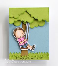 a card with a girl swinging on a tree