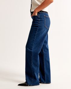 Elevate your denim collection with the Abercrombie & Fitch Women's Curve Love Low Rise Baggy Jean, tailored to flatter with a thoughtful design. This pair is a must-have for those who value both style and comfort.

- Size: 31 LONG
- Color: Dark with Raw Hem
- Material: Pocket Bag - Polyester, Cotton Blend
- Gender: Female
- Features: 8.5” low rise, relaxed at waist and hips, baggy full-length leg, raw hem finish
- Additional Details: Curve Love fit reduces waist gap, offering extra room through Everyday Dark Wash Flare Jeans With Frayed Hem, Relaxed Fit Dark Wash Jeans With Frayed Hem, Dark Wash Relaxed Fit Jeans With Standard Cut Leg, Dark Wash Relaxed Fit Jeans, Dark Wash Relaxed Fit Mid-rise Flare Jeans, Dark Wash Jeans For Everyday, Everyday Dark Wash Flare Jeans With Standard Cut Leg, Dark Wash Flare Jeans With Standard Cut Leg, Relaxed Fit Dark Wash Denim Flare Jeans