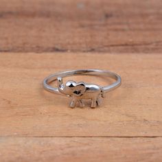 Cute Elephant Ring, Solid 925 Sterling Silver Elephant ring, Dainty Elephant Rings, fashion Animal Ring, Wedding/Engagement/Birthday Gifts Dimension :- JEWELRY CATEGORY:- HANDMADE RING METAL: - STERLING SILVER RING SIZE:- ALL SIZES AVAILABLE PURTY:- 925  Shipping:- All the parcels will be shipped with in 1-2 days of purchase... Payment:- We accept payment through PAYPAL only.... I make every effort to picture each item as realistic as I can but colors can be slightly different due to screen cali Elephant Rings Silver, Fine Jewelry Nickel-free Promise Ring, Nickel Free Fine Jewelry Promise Ring, Silver Fine Jewelry Stackable Rings For Gift, Nickel-free Fine Jewelry Rings For Anniversary, Silver Stackable Rings As Fine Jewelry Gift, Silver Stackable Rings Fine Jewelry For Gift, Anniversary Nickel-free Fine Jewelry Rings, Nickel-free Sterling Silver Ring For Birthday