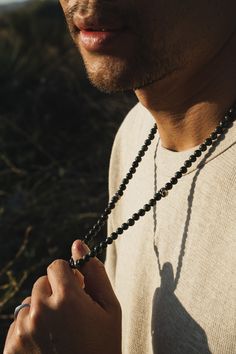 This handcrafted 26" necklace blends earthy Kambaba Jasper with rugged sterling silver. A heavy silver skull bead adds a focal point of edgy elegance. Sterling Silver Jasper 6mm Thickness 26" Length Handcrafted in LA Kambaba Jasper: Calming, Grounding, Growth, Balance Spiritual Jewelry With 108 Beads For Everyday, Everyday Spiritual Jewelry With 108 Beads, Artisan Jewelry With Round Beads For Everyday Use, Obsidian Beads Jewelry For Meditation, Obsidian 8mm Beads Jewelry For Meditation, Black Hand-knotted Jewelry With Round Beads, Artisan Black Necklaces With 8mm Beads, Artisan Black Necklace With 8mm Beads, Edgy Elegance