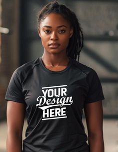 a woman wearing a black t - shirt that says your design is here on it