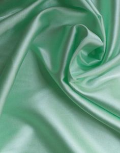 the green fabric is very soft and shiny