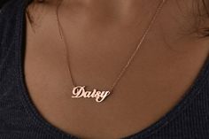 You can customize this personalized name jewelry with a name/ word of your choice. #PersonalizedNecklace #SilverNecklace #CustomNecklace #PersonalizedJewelry #PersonalizedGift #NameNecklace #initialnecklace #letternecklace #bridesmaidgift #goldnecklace #christmasgift #valentinesdaygift #romanticgifts #etsyseller #etsyjewelry #mothergift #birthdaygift #giftsforbestfriend #giftforher Personalized Rose Gold Stainless Steel Name Necklace, Rose Gold Name Necklace In Stainless Steel, Rose Gold Stainless Steel Name Necklace, Custom Rose Gold Nameplate Necklace With Name, Custom Nameplate Necklace In Rose Gold, Custom Name Stainless Steel Necklace Gift, Anniversary Stainless Steel Name Necklace, Customizable Rose Gold Name Necklace For Birthday, Personalized Rose Gold Letter Jewelry