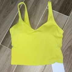 Nwt Lululemon Align Nulu Crop Style Tank Nwt Lululemon Align Nulu Crop Style Tank Yellow Serpentine Perfect! Tank Size 8 100% Authentic So Gorgeous Light Support: Intended To Provide Light Support For An A/B Cup Other Colors Available Listed Separately Listing Is For Soleil Yellow Sizes 0-14 Fit A/B Cups Tight Fit Contours Your Body Cropped Length Is Cut Above The Waistperfect With High-Rise Pants Lycra: Added Lycra Fibre For Shape Retention Built-In Bra: Built-In Bra Gives You Added Support And Yellow Stretch Seamless Sports Bra, Yellow Seamless Stretch Sports Bra, Yellow Sporty Sports Bra For Summer, Yellow Stretch Sports Bra, Casual Style, Yellow Stretch Sports Bra For Yoga, Yellow Stretch Activewear With Light Support, Yellow Sleeveless Sports Bra For Gym, Yellow Summer Sports Bra For Gym, Yellow Sleeveless Activewear For Gym