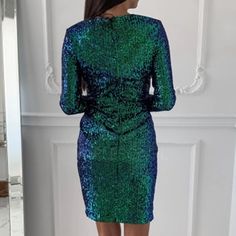 FREE SHIPPING Women Deep V-Neck Sequin Mini Bodycon Dress JKP3475 Green Sequin Bodycon Dress For Party Season, Green Bodycon Dress For Night Out Party Season, Glamorous Green Sequined Bodycon Dress, Green Mini Bodycon Dress For Party Season, Green Sequin Bodycon Cocktail Dress, Fitted Green Sequined Bodycon Dress, Green Mini Bodycon Party Dress, Green Mini Bodycon Dress For Party, Green Mini Length Bodycon Dress For Party