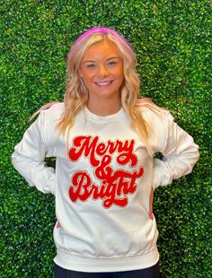 This Merry & Bright Chenille Sweatshirt is perfect for the festive season! Stay cozy and stylish with its bold red chenille on a white sweatshirt, and treat yourself to a special gift this Christmas. Embrace the holiday spirit and bring joy to those around you! Unisex sizing and fit Pictured: White Sweatshirt SPECIAL CARE - WASHING INSTRUCTIONS: Hand washing and air drying are always best for these items. Wash on delicate, cold, and inside out. Always air dry to prevent lint from sticking to the White Festive Holiday Sweater, White Holiday Festive Sweater, White Christmas Holiday Sweatshirt, White Casual Sweater For Festive Occasions, White Long Sleeve Holiday Sweatshirt, Casual White Sweater For Festive Occasions, Casual White Festive Sweater, White Cotton Christmas Sweatshirt, White Christmas Sweatshirt Relaxed Fit